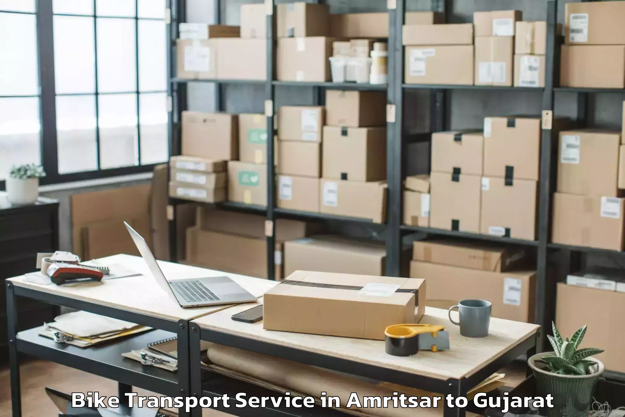 Top Amritsar to Porbandar Airport Pbd Bike Transport Available